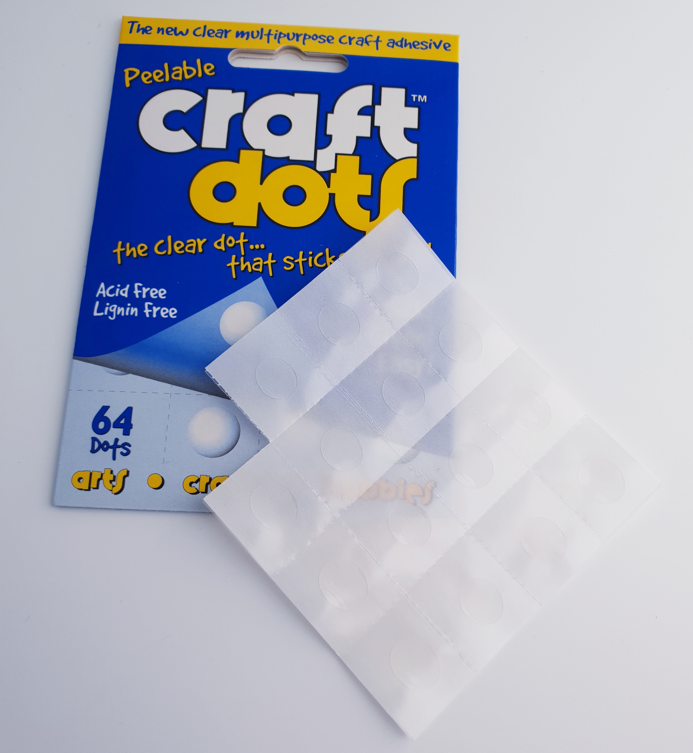 Transparente Gluedots auf Glas und Kunststoff